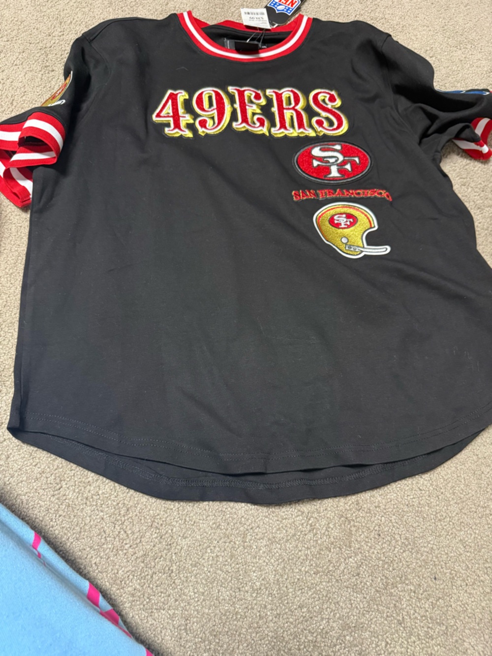 NFL San Francisco 49ers Black Short Sleeve Jersey Tee with Red and Gold Accents